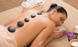 A hot stone massage from the beauty factor