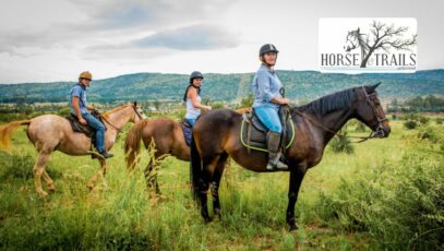 Three people enjoying a horse riding experience at Harties Horse and Trail Unlimited in Hartbeespoort.