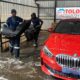 Expert staff at Tolo Car Clinic in Cosmo City conducting a Full-House Valet on a red BMW.