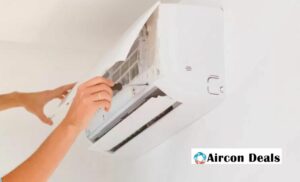 A person servicing an aircon from Aircon Deals in Cape Town