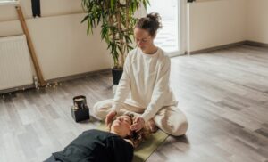 A woman undergoing energy healing