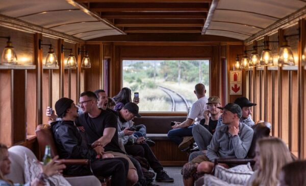 Passengers aboard the Cape Rail Company train