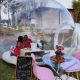A couple enjoying a bubble picnic at Pamensky Mobile Spa in Hartbeespoort