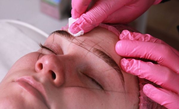 A woman getting microblading done at TK Brow Artistry in Boksburg