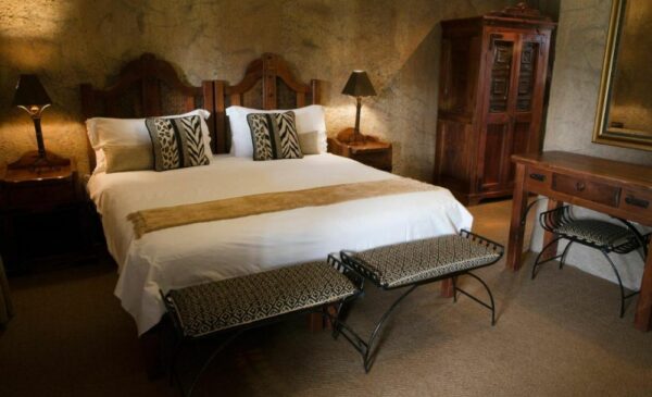 The bedroom at the Zebra Stables lodge at the Zebra Nature Reserve in Cullinan