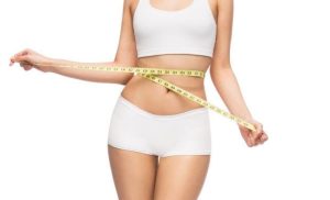 A stock photo of a woman after a slimming treatment package