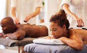A stock photo of a couple enjoying a massage together