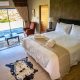 The bedroom in the 2 bedroom villa at Umbono Private Game Lodge in Alexandria