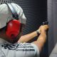 A man aiming at a target during a shooting experience at Kolshoot Potshot in Randburg