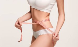 A stock photo of a woman after a slimming treatment