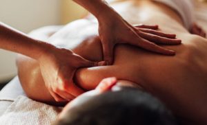 A stock photo of a person getting a massage at the spa