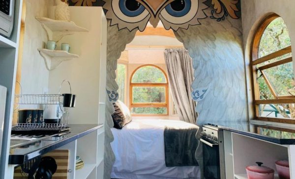 The bedroom inside the Owl Vardo from Treedom Villas and Vardos in Wilderness