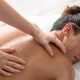 A stock photo of a man getting a massage at the spa