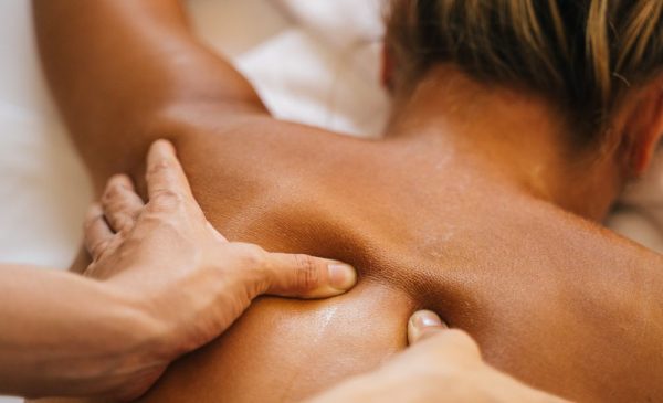 A stock photo of a woman having a massage at the spa