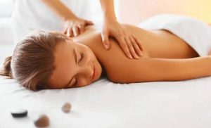 A stock photo of a woman getting a massage at the spa