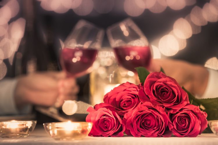Roses and couple wine glasses
