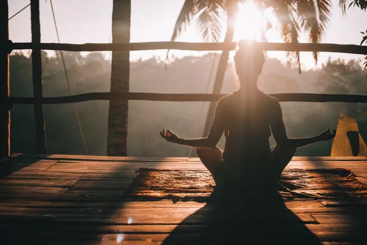 Woman doing Yoga pose in Ubud, GIanyar, Bali, Indonesia - Jared Rice on Unsplash 